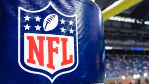 FILE - This Aug. 9, 2014 file photo shows an NFL logo on a goal post pad before a preseason NFL football game between the Detroit Lions and the Cleveland Browns at Ford Field in Detroit. (AP/Rick Osentoski, File)